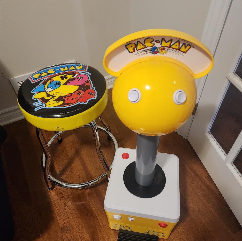 Arcade1Up Pac-Man Giant Joystick  plug-and-play game console with 10 games.